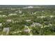 An aerial view of a house in a quiet neighborhood at 265 Tipton St, Port Charlotte, FL 33954