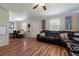 Open concept living area with sectional sofa and dining area at 265 Tipton St, Port Charlotte, FL 33954