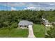 Aerial view of a single-story house with a driveway at 265 Tipton St, Port Charlotte, FL 33954