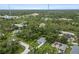 Aerial view showcasing a single-Gathering home and surrounding area at 265 Tipton St, Port Charlotte, FL 33954