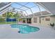 Relaxing screened-in pool with plenty of space for guests at 5001 Richmond Ter, North Port, FL 34287