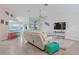 Bright living room with vaulted ceiling, comfy seating, and large TV at 5001 Richmond Ter, North Port, FL 34287