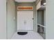 White double doors leading into a beautifully maintained home at 5001 Richmond Ter, North Port, FL 34287
