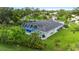 Single-Gathering home with pool and screened enclosure; large backyard at 5001 Richmond Ter, North Port, FL 34287