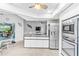 Modern kitchen with island, stainless steel appliances, and granite countertops at 5001 Richmond Ter, North Port, FL 34287