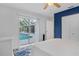Bedroom with pool view and sliding glass doors at 5001 Richmond Ter, North Port, FL 34287