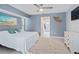 Spacious bedroom with king-size bed and ensuite bathroom access at 5001 Richmond Ter, North Port, FL 34287