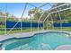 Enjoy this relaxing screened-in pool and patio area at 5001 Richmond Ter, North Port, FL 34287