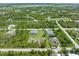 Aerial view showcasing the property and surrounding area at 14041 Clarissa Ln, Port Charlotte, FL 33981