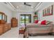 Main bedroom with king bed and access to the pool at 14041 Clarissa Ln, Port Charlotte, FL 33981