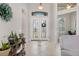 Bright and spacious entryway with tile flooring and double doors at 14041 Clarissa Ln, Port Charlotte, FL 33981