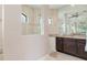 Large bathroom with walk-in shower and granite vanity at 14041 Clarissa Ln, Port Charlotte, FL 33981