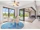 Bright breakfast nook with sliding glass doors leading to the pool area at 14041 Clarissa Ln, Port Charlotte, FL 33981