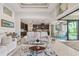Open concept living area with a view of the kitchen and dining area at 14041 Clarissa Ln, Port Charlotte, FL 33981