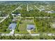 Aerial view showing the property and surrounding neighborhood at 14041 Clarissa Ln, Port Charlotte, FL 33981