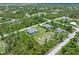 Aerial view of the property and neighborhood at 14041 Clarissa Ln, Port Charlotte, FL 33981