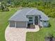 Aerial view of a single-Gathering home with three-car garage at 14041 Clarissa Ln, Port Charlotte, FL 33981