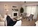 Bright living room with plush seating and a stylish electric fireplace at 7100 Mineola Rd, Englewood, FL 34224