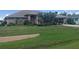 One story house with mature landscaping and a large yard at 7100 Mineola Rd, Englewood, FL 34224