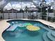 Enjoy this refreshing pool and patio area with seating at 7100 Mineola Rd, Englewood, FL 34224