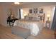 Spacious Primary bedroom with king-size bed and neutral decor at 7100 Mineola Rd, Englewood, FL 34224