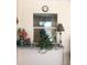 Covered lanai with seating area and potted plants at 7100 Mineola Rd, Englewood, FL 34224