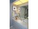 Clean bathroom with a vanity, sink, and mirror at 7100 Mineola Rd, Englewood, FL 34224