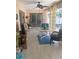 Relaxing lanai with seating area and tiled floor at 7100 Mineola Rd, Englewood, FL 34224