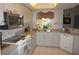 Efficient kitchen with stainless steel appliances and ample counter space at 7100 Mineola Rd, Englewood, FL 34224