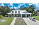 Aerial view of a charming two-story house with a two-car garage at 1109 Harbour Glen Pl, Punta Gorda, FL 33983