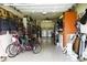 Spacious garage with washer, dryer, fridge, and ample room for storage and other possibilities at 20347 Mount Prospect Ave, Port Charlotte, FL 33952