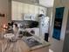 Well-equipped kitchen with granite countertops at 26470 Rampart Blvd # 123, Punta Gorda, FL 33983