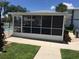 Community gazebo with screened enclosure and grill at 26470 Rampart Blvd # 123, Punta Gorda, FL 33983