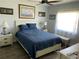 Comfortable bedroom with a queen-size bed and window at 26470 Rampart Blvd # 123, Punta Gorda, FL 33983