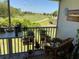 Spacious balcony with scenic golf course view at 26470 Rampart Blvd # 123, Punta Gorda, FL 33983