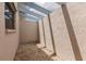 Small, private backyard patio with gravel flooring at 3621 Whippoorwill Blvd, Punta Gorda, FL 33950