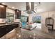 Modern kitchen with expansive granite countertop and stainless steel appliances at 3621 Whippoorwill Blvd, Punta Gorda, FL 33950