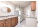 Updated bathroom with granite countertops and a large walk-in shower at 3621 Whippoorwill Blvd, Punta Gorda, FL 33950