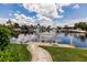 Private boat dock with lift, offering easy access to the waterway at 3621 Whippoorwill Blvd, Punta Gorda, FL 33950