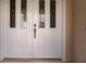 Double front doors with beveled glass accents at 3621 Whippoorwill Blvd, Punta Gorda, FL 33950