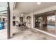 Spacious covered patio with seating area and pool view at 3621 Whippoorwill Blvd, Punta Gorda, FL 33950