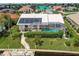 Backyard oasis with a screened pool and solar panels at 3621 Whippoorwill Blvd, Punta Gorda, FL 33950