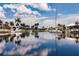 Tranquil canal setting with yachts and sailboats at 3621 Whippoorwill Blvd, Punta Gorda, FL 33950