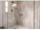 Walk-in shower with glass enclosure and modern tile at 3621 Whippoorwill Blvd, Punta Gorda, FL 33950