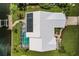 Property features a metal roof and solar panels, next to a canal at 3621 Whippoorwill Blvd, Punta Gorda, FL 33950