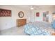 Spacious bedroom with king-size bed, ceiling fan, and built-in dresser at 3621 Whippoorwill Blvd, Punta Gorda, FL 33950