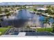 Property features a pool, solar panels, and canal access at 3621 Whippoorwill Blvd, Punta Gorda, FL 33950