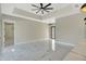 Open concept living room with modern fixtures and bright, marble floors at 212 Fairway Rd, Rotonda West, FL 33947