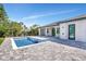 A refreshing swimming pool and spacious deck complement this home's outdoor living area at 212 Fairway Rd, Rotonda West, FL 33947