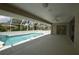 Beautiful screened-in pool with a spacious patio, perfect for enjoying the outdoors year-round at 515 Allworthy St, Port Charlotte, FL 33954